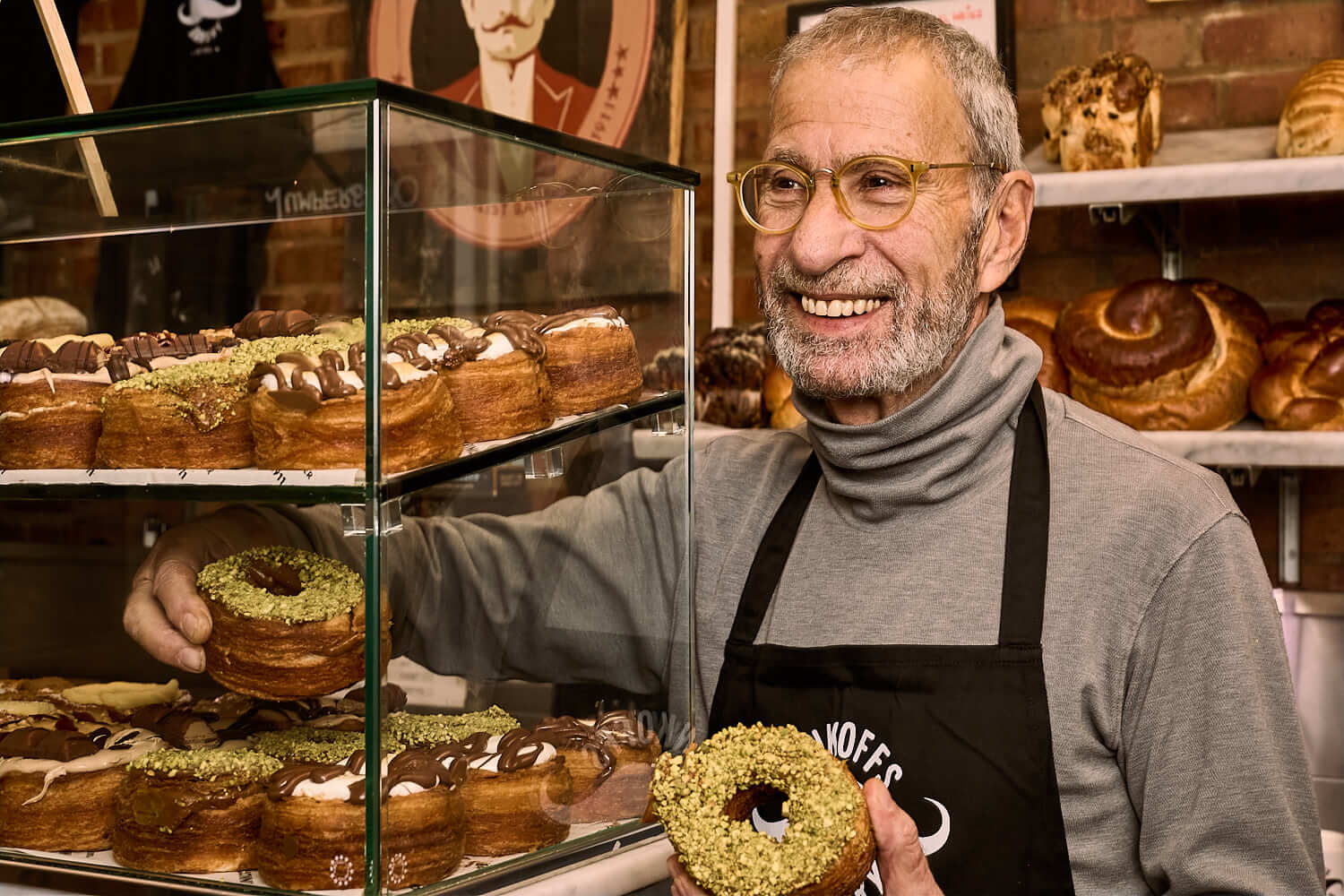 Ray Rinkoff master baker holding a pistachio Crodough